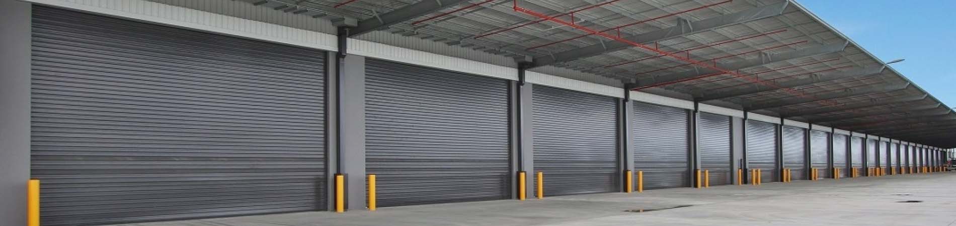 Steel roller shutter doors closed, securing a building